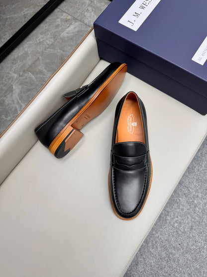 Mocassin 180 en cuir noir à surpiqûres blanches