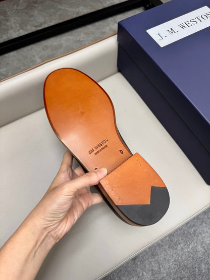 Mocassin 180 en cuir noir à surpiqûres blanches