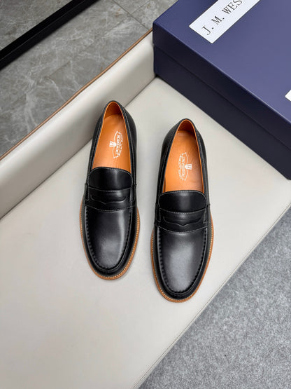 Mocassin 180 en cuir noir à surpiqûres blanches